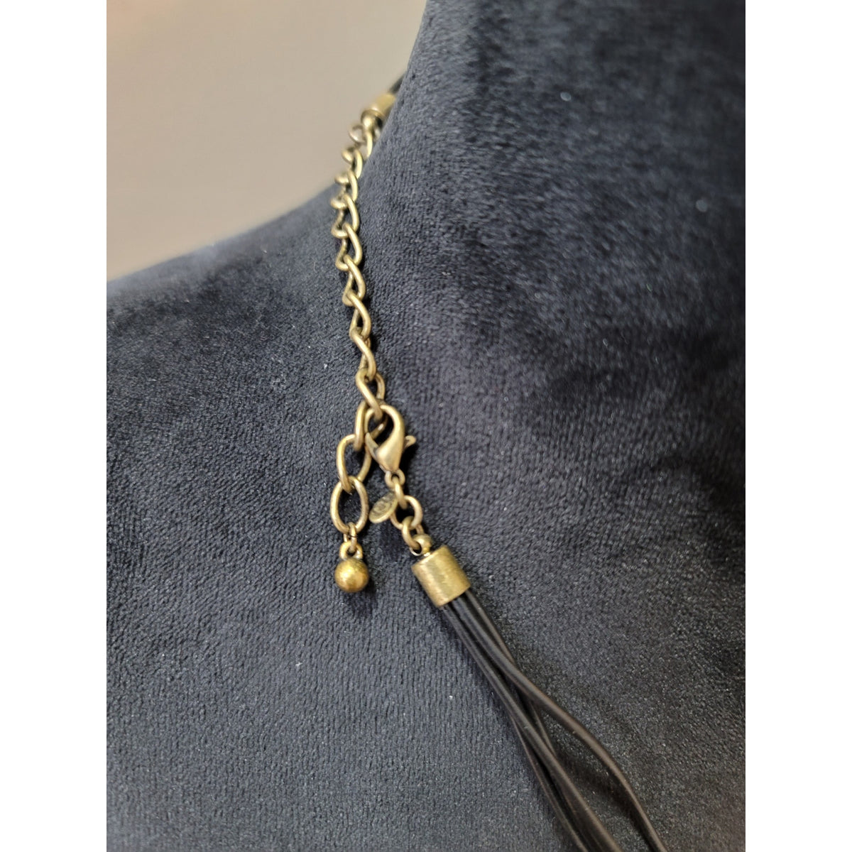 Women's Spiral Pendant Necklace with Bronze Disc and Black Leather Cord