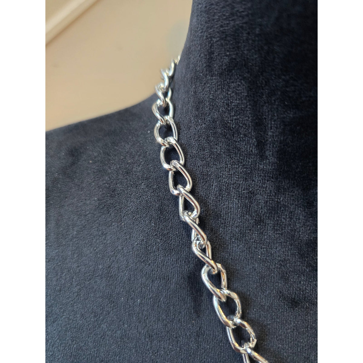 Silver Tone Ornate Cross Pendant with Central Coral Stone Link Chain Necklace