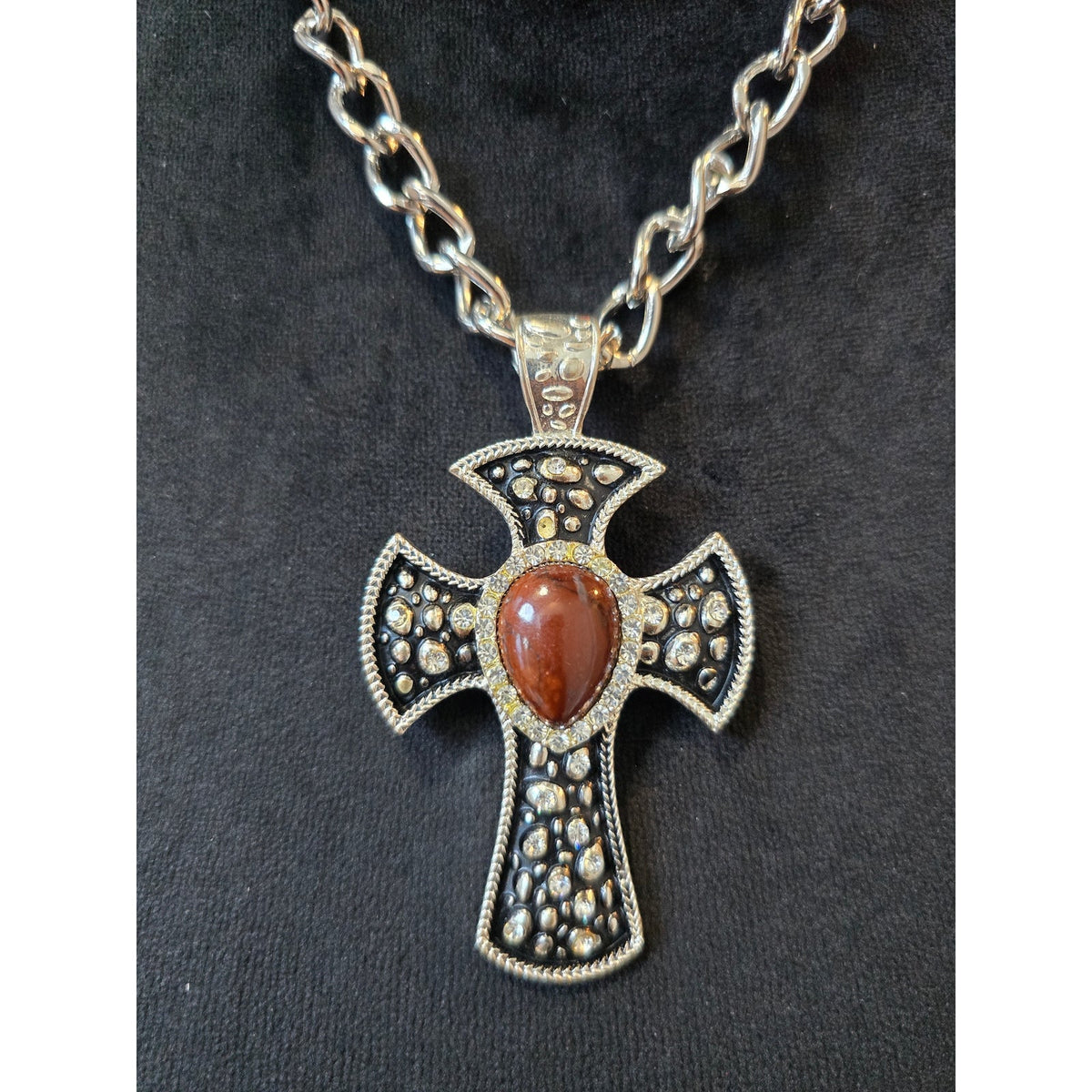 Silver Tone Ornate Cross Pendant with Central Coral Stone Link Chain Necklace