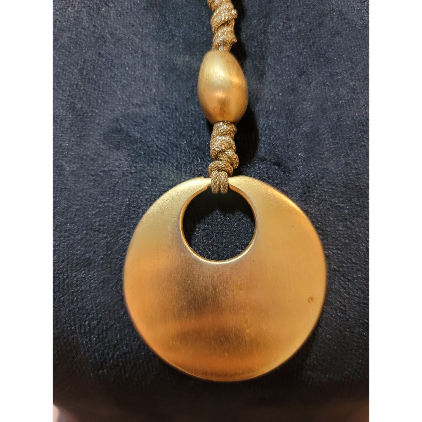 Women's Gold Circle Pendant Necklace with Braided Cord and Unique Bead Design
