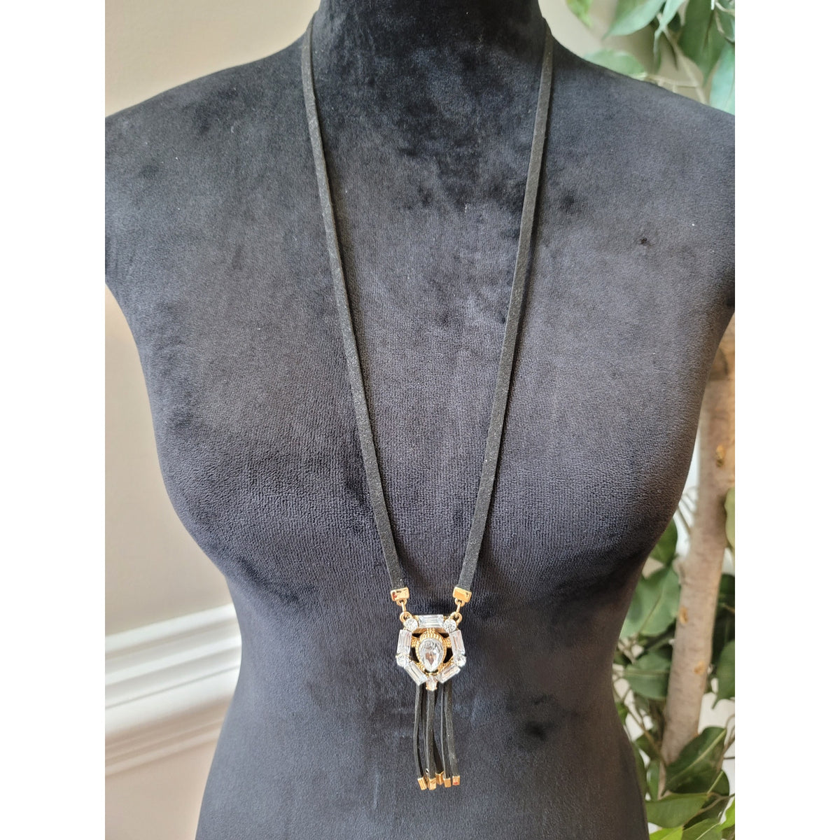 Women's Long Black Suede Tassel Necklace With Gold Accents And Crystal Pendant