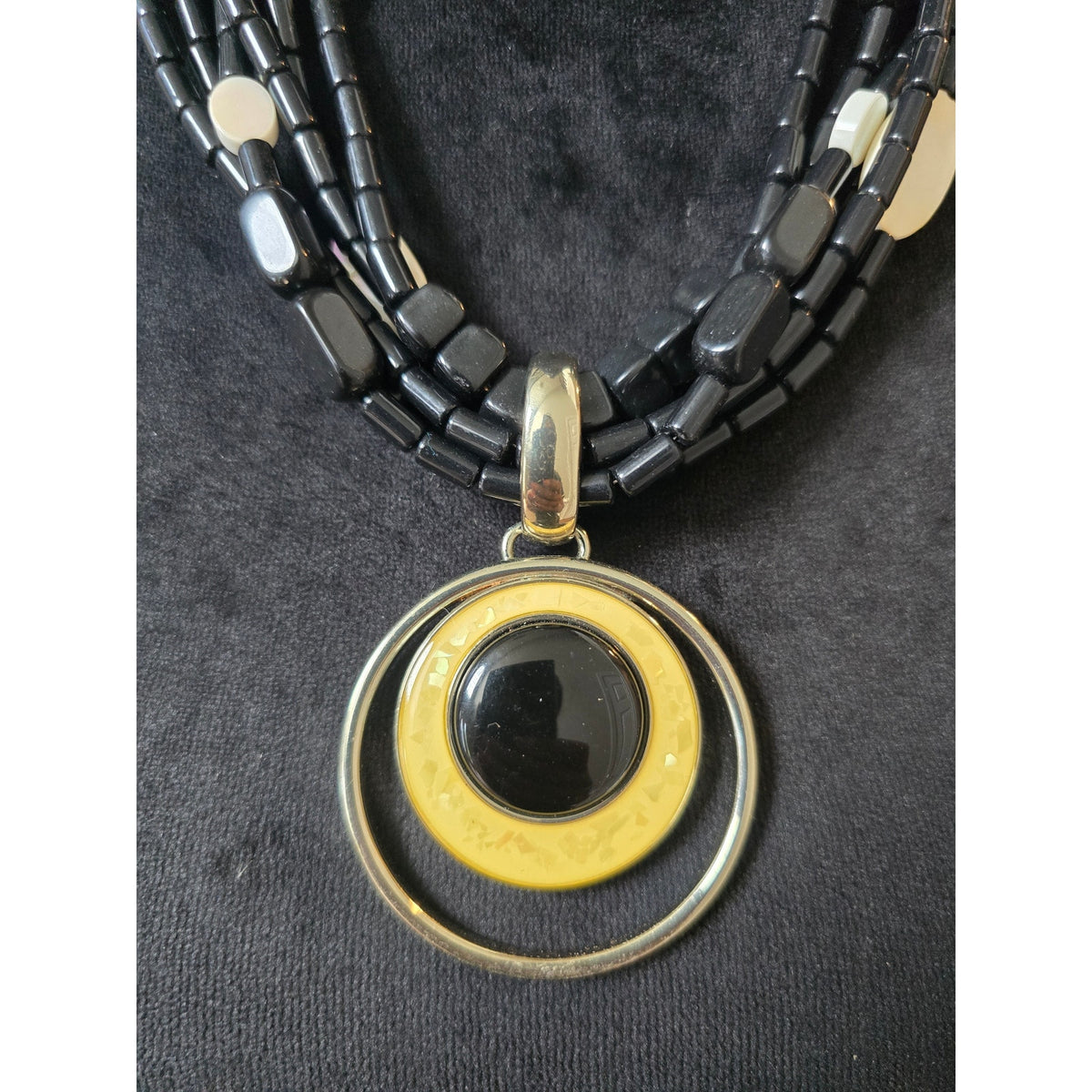 Black Multi Strand Gold Circle Pendant Necklace