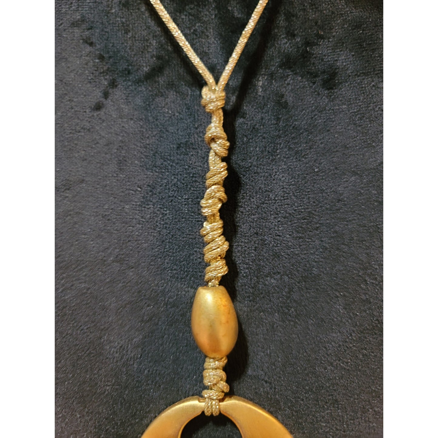 Women's Gold Circle Pendant Necklace with Braided Cord and Unique Bead Design