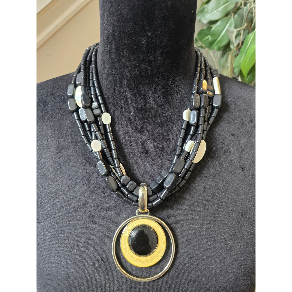 Black Multi Strand Gold Circle Pendant Necklace