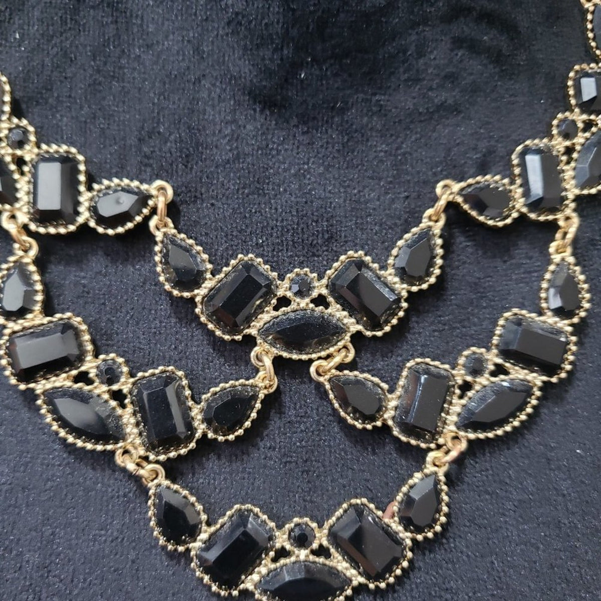 Women's Gold Tone Metal Link Chain Black Crystal Inset Articulated Bib Necklace