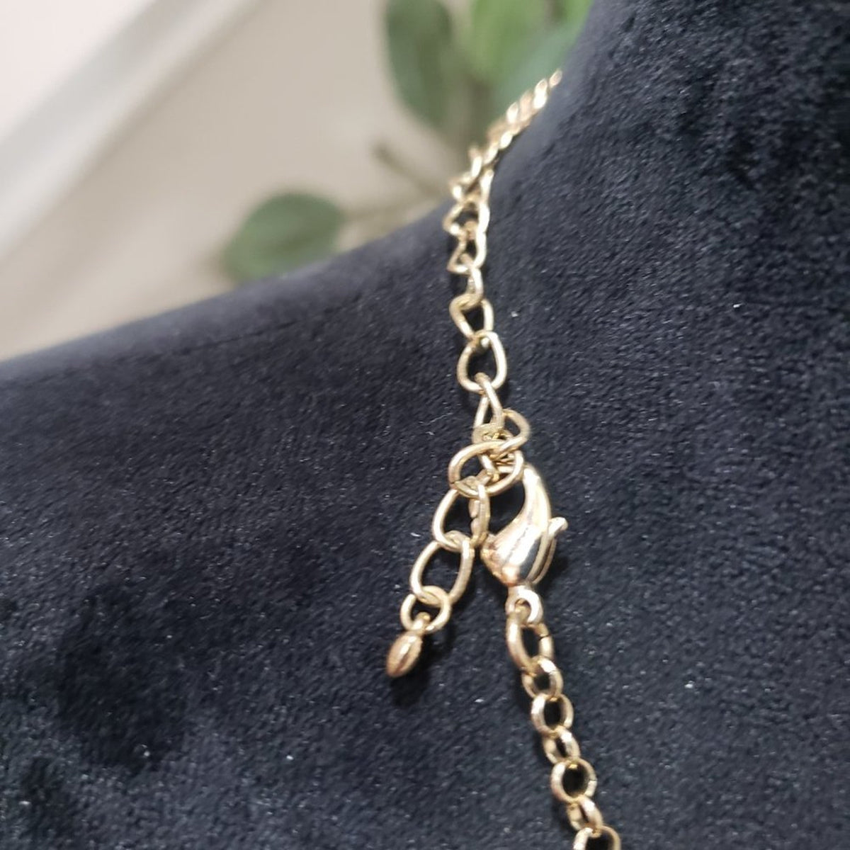 Women's Gold Tone Metal Link Chain Black Crystal Inset Articulated Bib Necklace