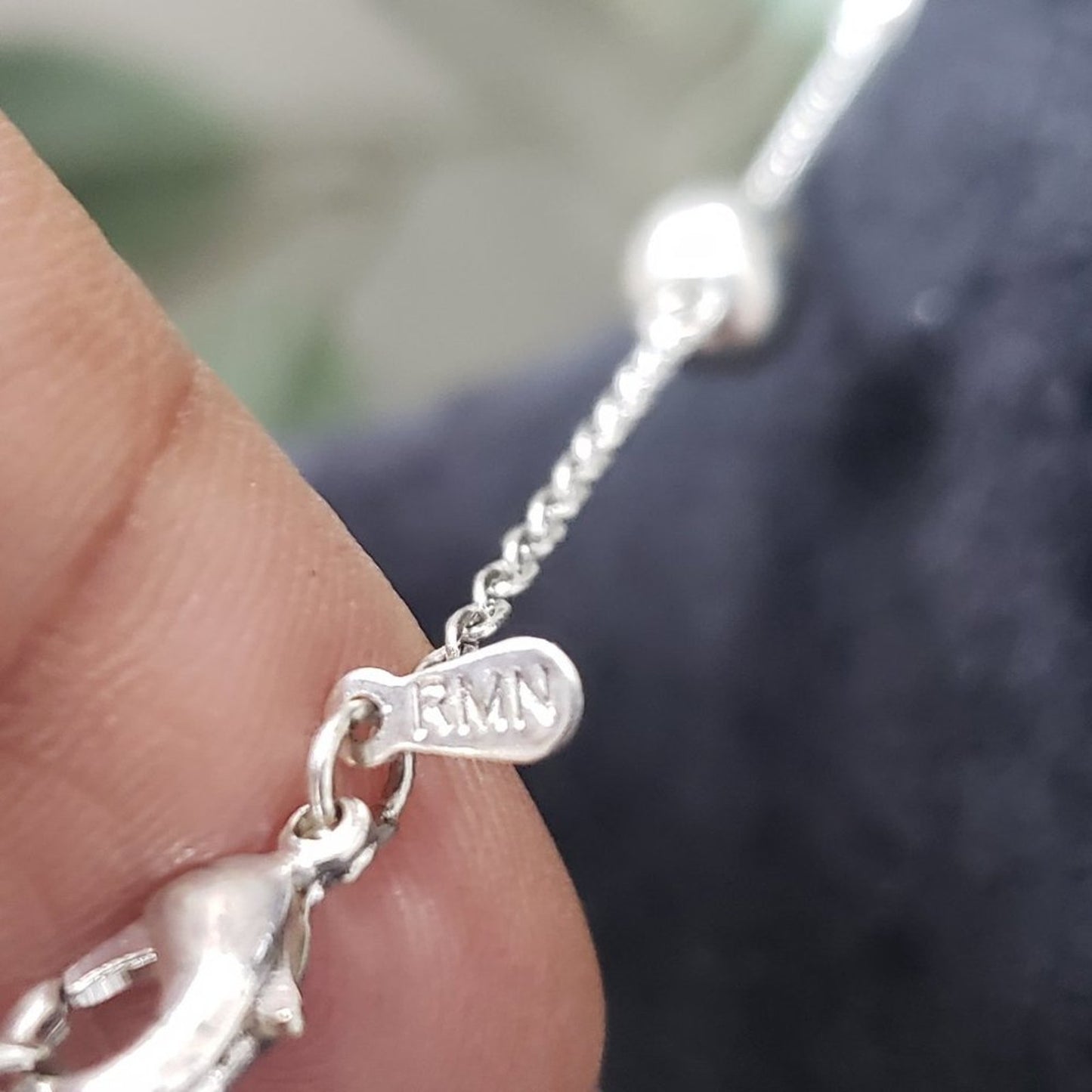 RMN Womens Silver and Brass Tone Beaded Charm Necklace with Lobster Clasp