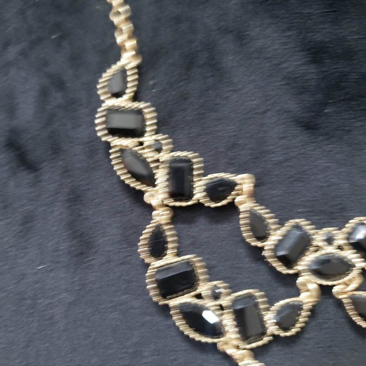 Women's Gold Tone Metal Link Chain Black Crystal Inset Articulated Bib Necklace