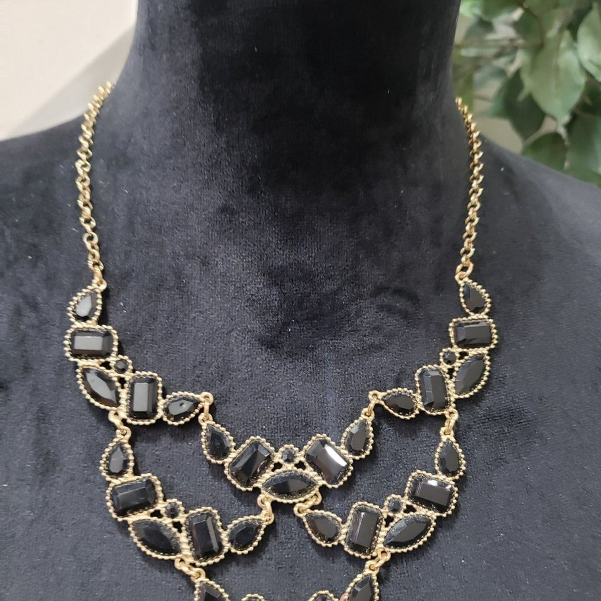 Women's Gold Tone Metal Link Chain Black Crystal Inset Articulated Bib Necklace